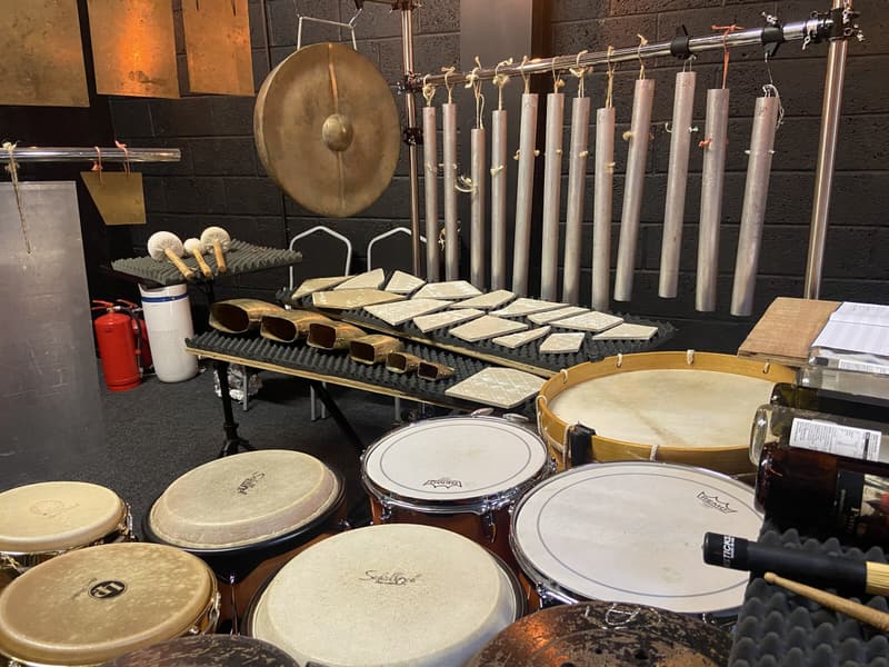 Tuned aluminium pipes tiles cowbells gong and congas